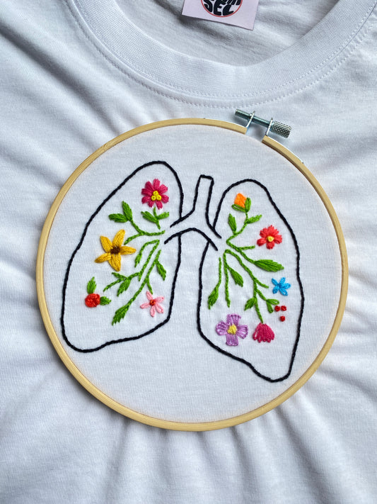 T-SHIRT “POLMONI FIORITI”