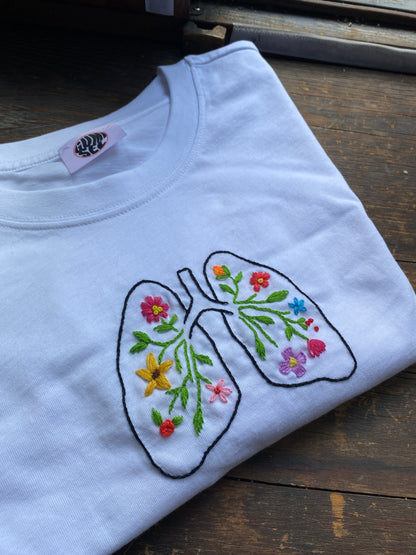 T-SHIRT “POLMONI FIORITI”